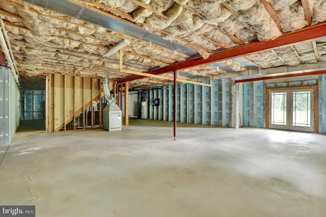 a view of a room with wooden walls