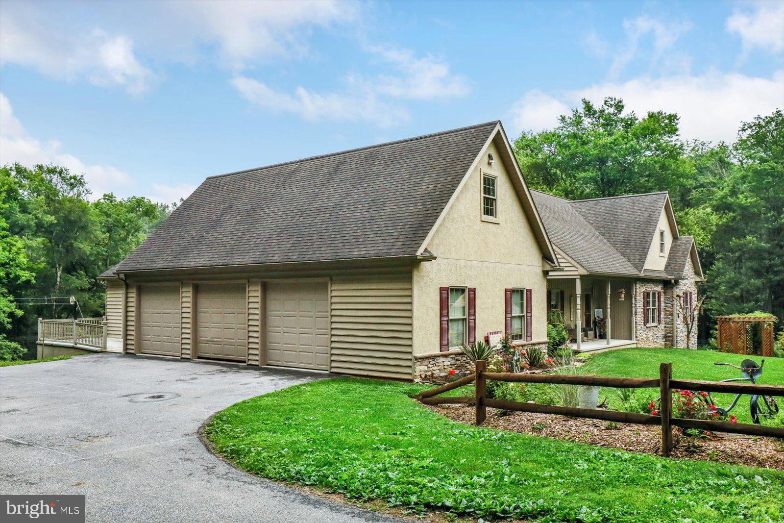 1881 Georgetown Road Christiana, PA 17509 - Photo 5 of 45 a front view of a house with a yard