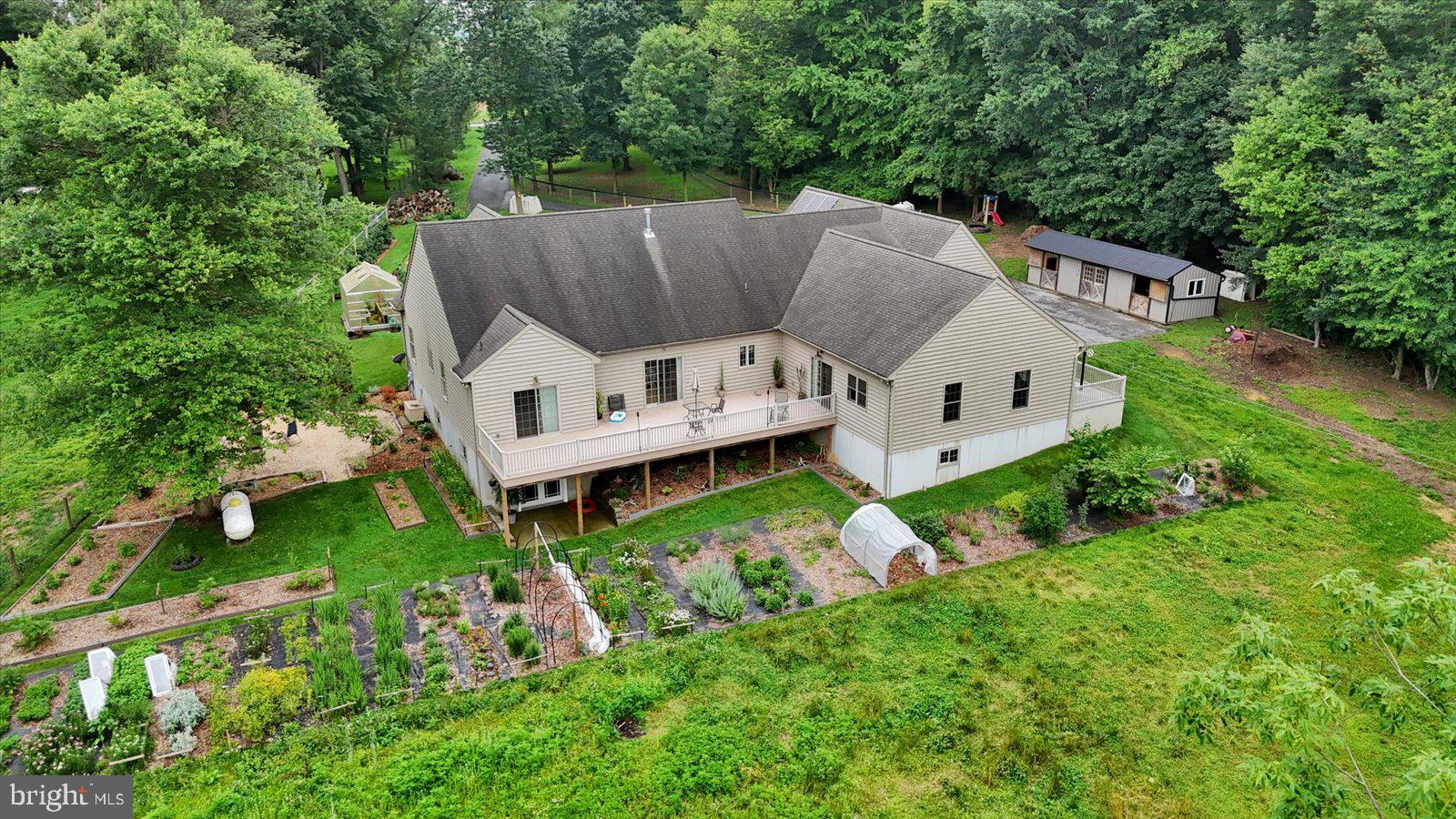 1881 Georgetown Road Christiana, PA 17509 - Photo 8 of 45 a view of a house with a yard and sitting area