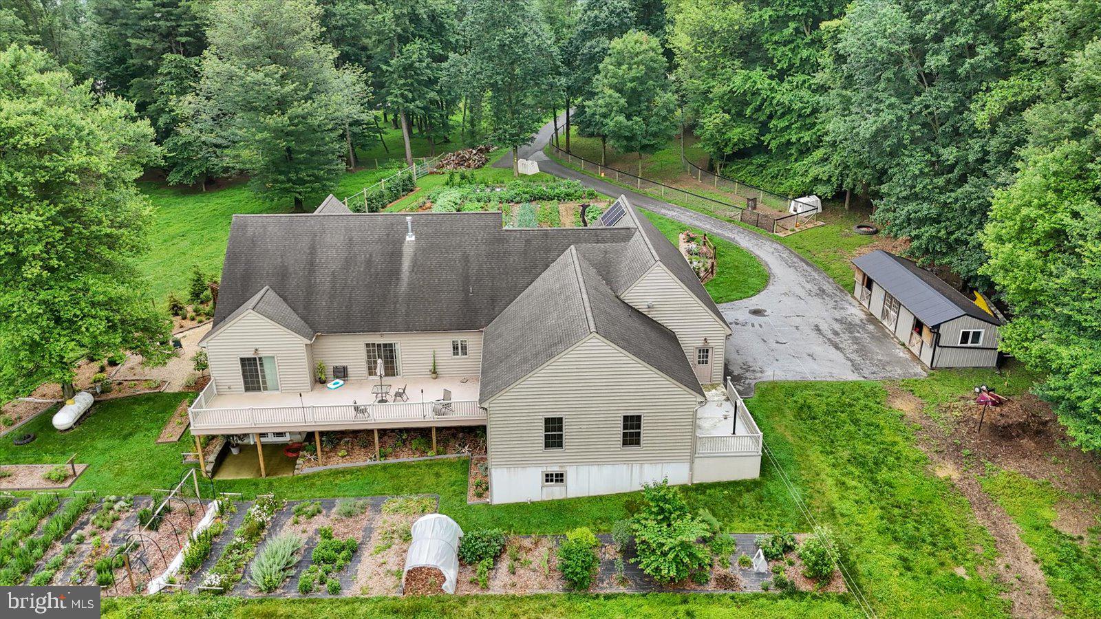 1881 Georgetown Road Christiana, PA 17509 - Photo 9 of 45 a aerial view of a house with a yard and sitting area