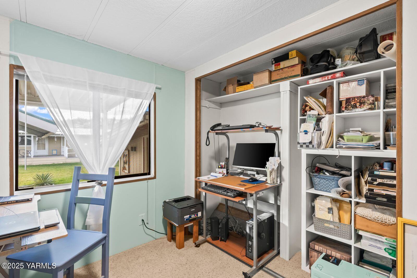 3601 Castlevale Road, Unit 14 Yakima, WA 98902 - Photo 17 of 24 a view of work space with furniture and a window