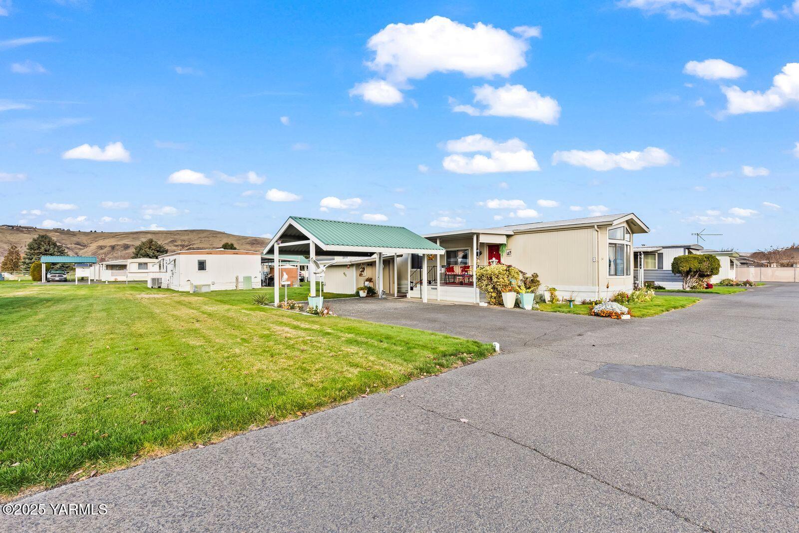 3601 Castlevale Road, Unit 14 Yakima, WA 98902 - Photo 20 of 24 a childrens park with lots of swings and slides
