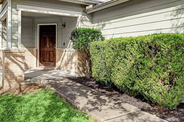 a view of entrance gate of the house