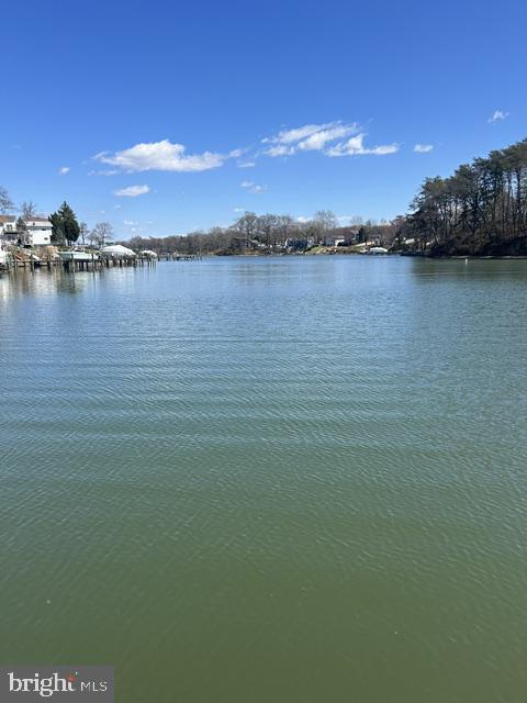 1217 Valley Road Pasadena, MD 21122 - Photo 39 of 76 Tranquil waters under a blue sky.