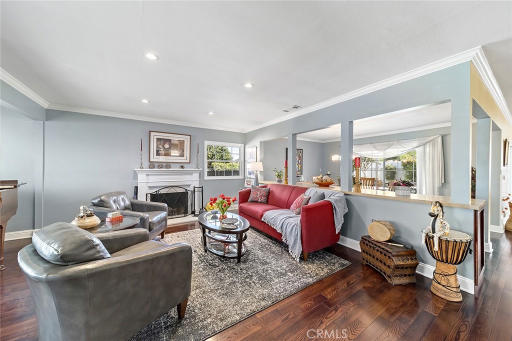 2818 Ostrom Avenue Long Beach, CA 90815 - Photo 2 of 41 a living room with furniture or couch and a wooden floor
