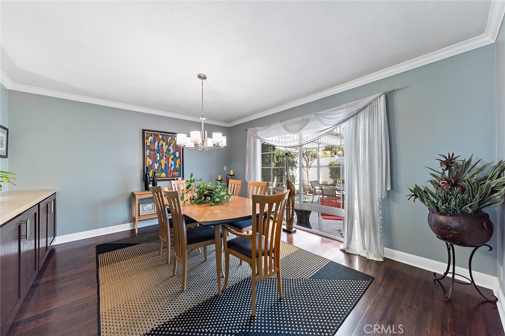 2818 Ostrom Avenue Long Beach, CA 90815 - Photo 20 of 41 a view of a dining room with furniture window and wooden floor