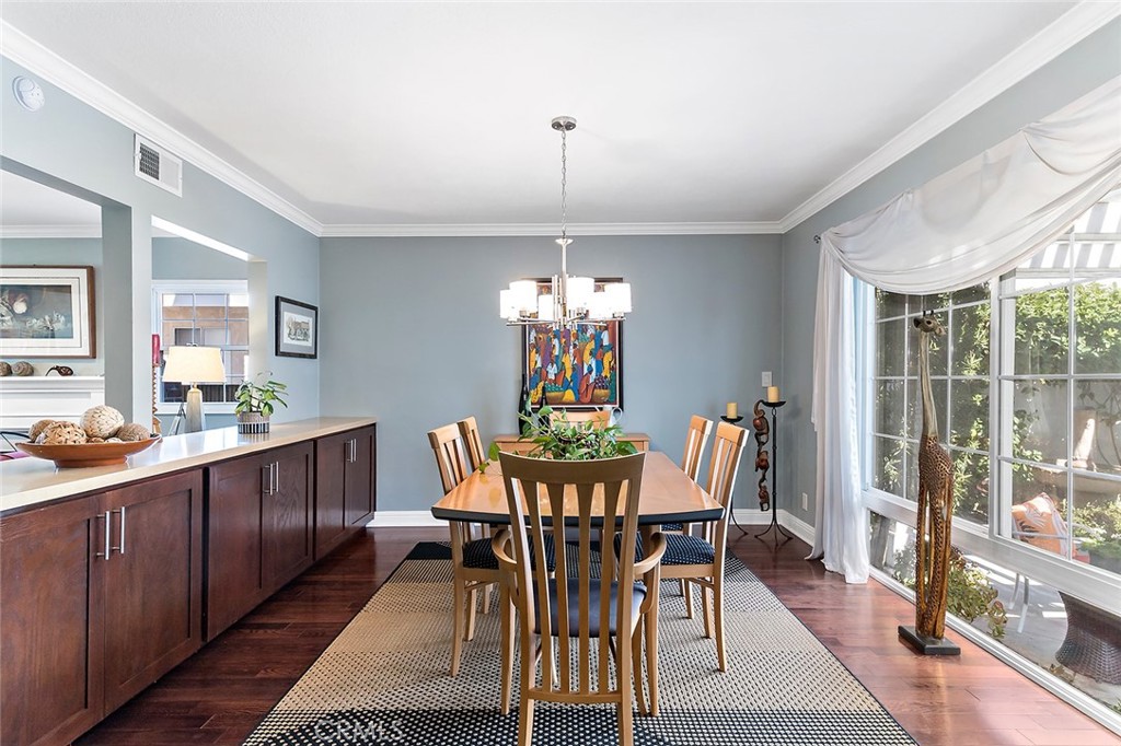 2818 Ostrom Avenue Long Beach, CA 90815 - Photo 22 of 41 a view of a dining room with furniture window and outside view