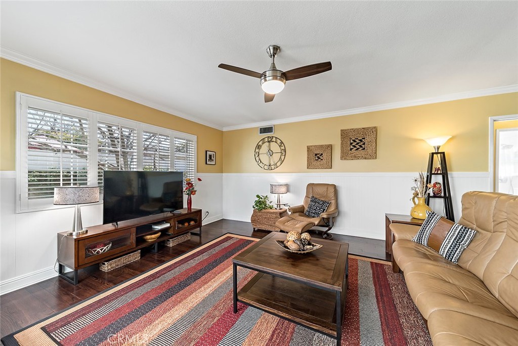 2818 Ostrom Avenue Long Beach, CA 90815 - Photo 25 of 41 a living room with furniture and a flat screen tv