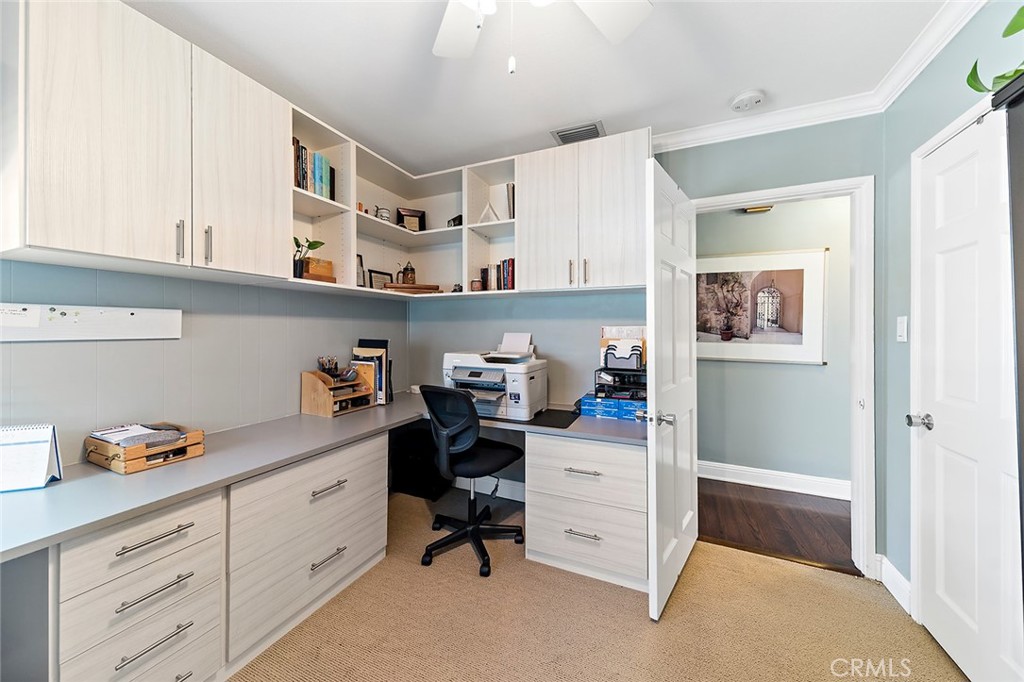 2818 Ostrom Avenue Long Beach, CA 90815 - Photo 26 of 41 a room with cabinets and furniture