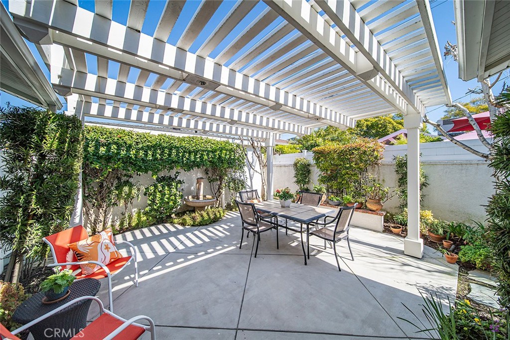 2818 Ostrom Avenue Long Beach, CA 90815 - Photo 37 of 41 a patio with patio outdoor seating and yard