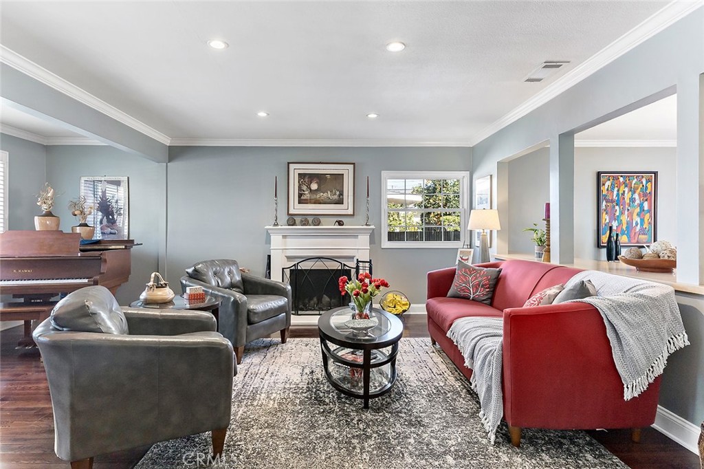 2818 Ostrom Avenue Long Beach, CA 90815 - Photo 3 of 41 a living room with furniture fireplace and window