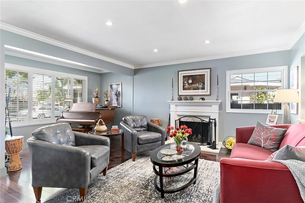 2818 Ostrom Avenue Long Beach, CA 90815 - Photo 4 of 41 a living room with furniture fireplace and a large window