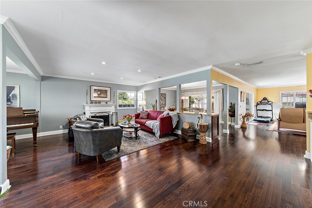 2818 Ostrom Avenue Long Beach, CA 90815 - Photo 6 of 41 a living room with furniture and a wooden floor