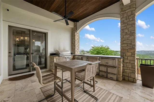 a view of an outdoor space with furniture