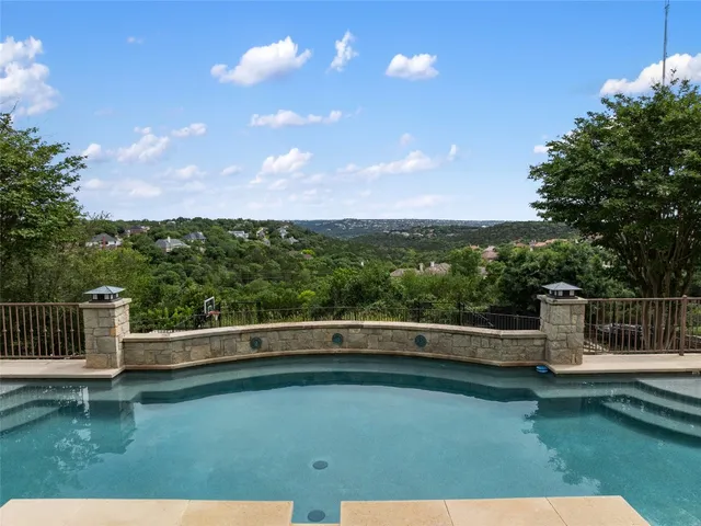 a view of outdoor space and swimming pool