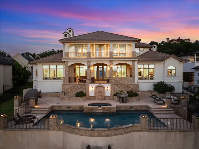 a front view of a house with swimming pool