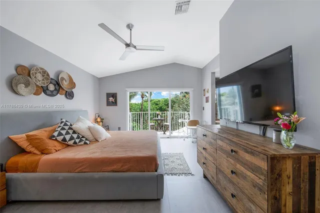 a spacious bathroom with a shower and a sink