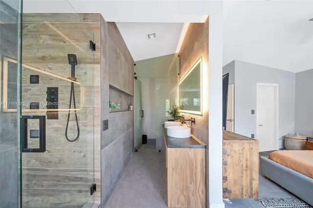 a living room with furniture a rug and a large window