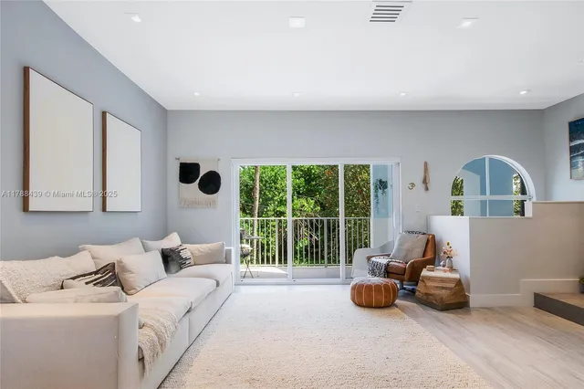 a living room with furniture and a couch