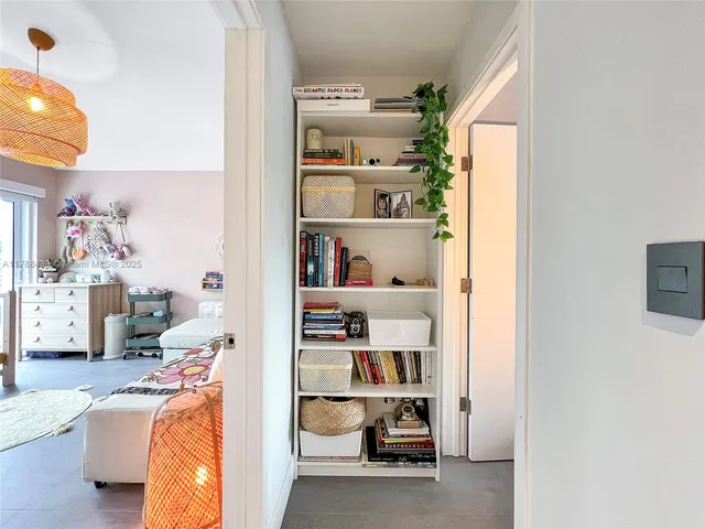a view of a house with swimming pool and sitting area