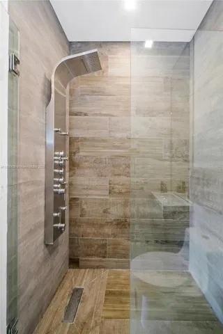 a view of a patio with swimming pool table and chairs