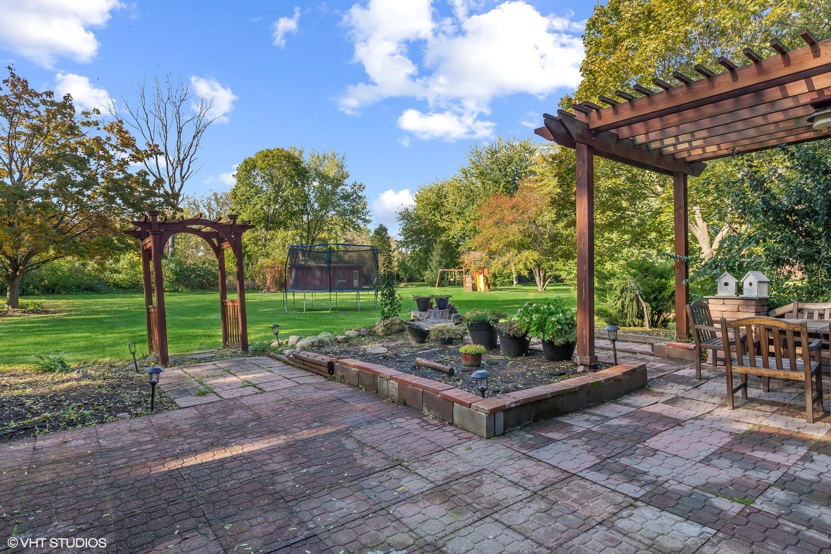 13N368 High Chapparal Elgin, IL 60124 - Photo 27 of 31 a view of a patio with chairs and a yard