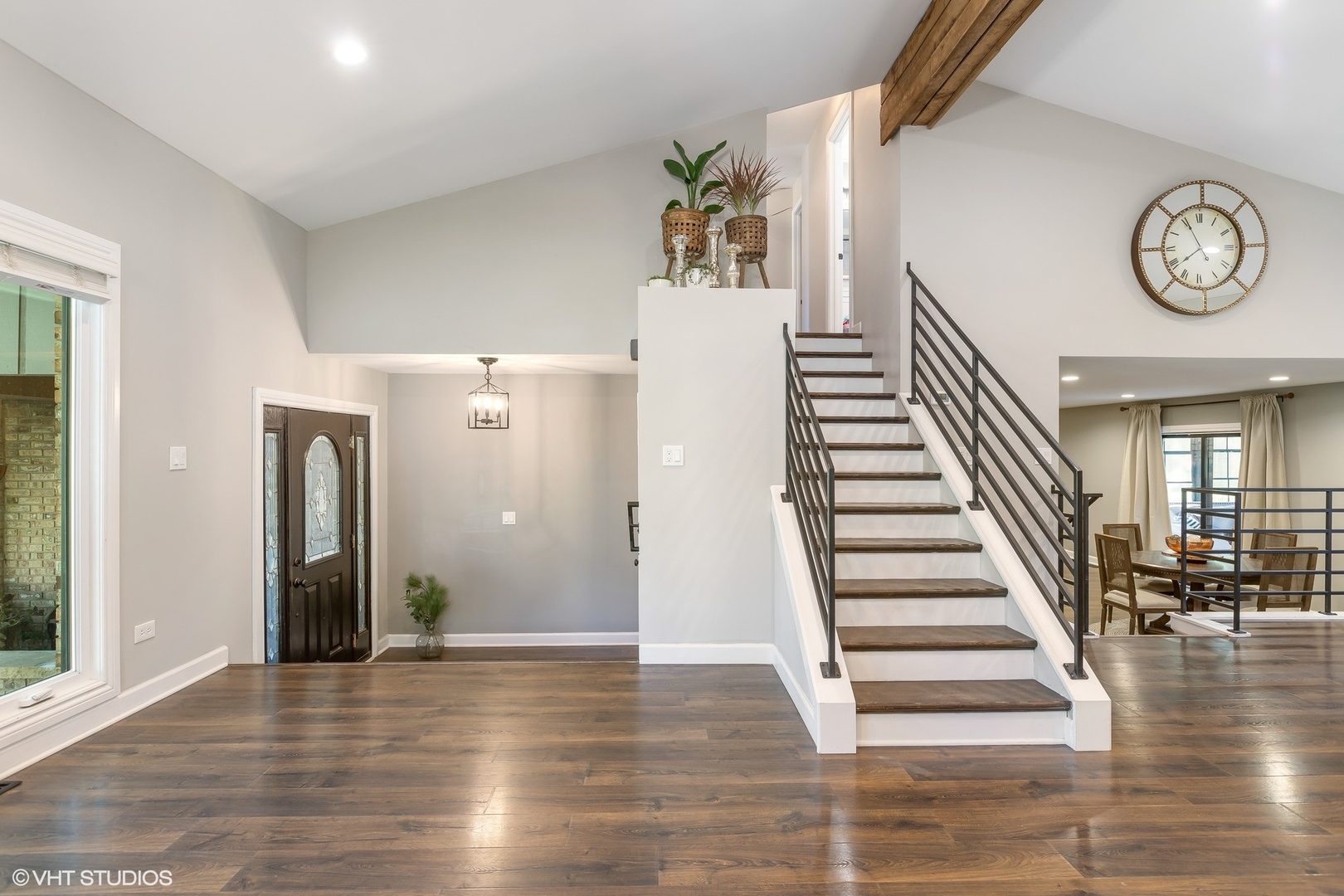 13N368 High Chapparal Elgin, IL 60124 - Photo 7 of 31 a view of a hallway with wooden floor and front door