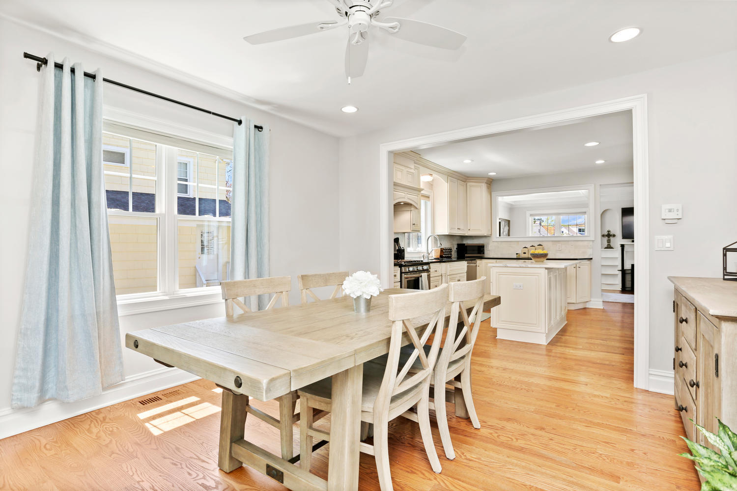 183 Rockland Road Fairfield, CT 06825 - Photo 10 of 27 a view of a dining room with furniture and wooden floor