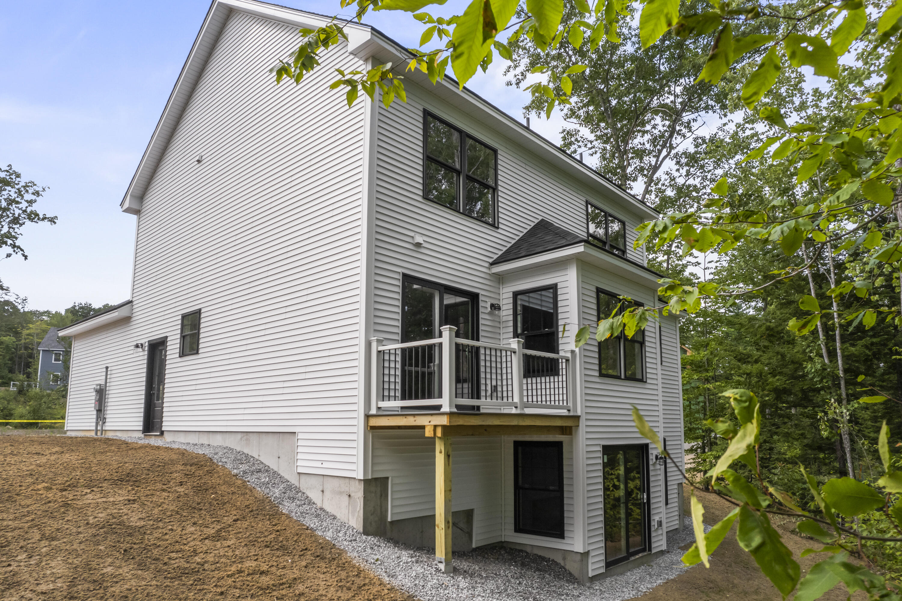 56 Woodbrey Lane Standish, ME 04084 - Photo 5 of 51 56 Woodbrey Ln_147 back of house 2