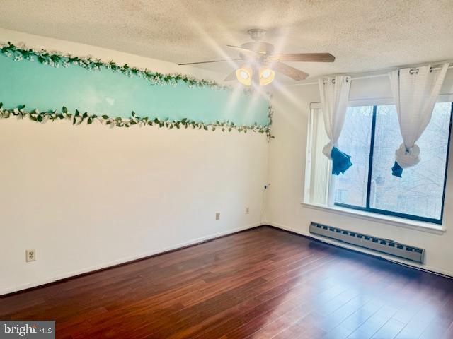 15211 Elkridge Way, Unit 943C Silver Spring, MD 20906 - Photo 13 of 16 a view of a room with gym equipment and wooden floor