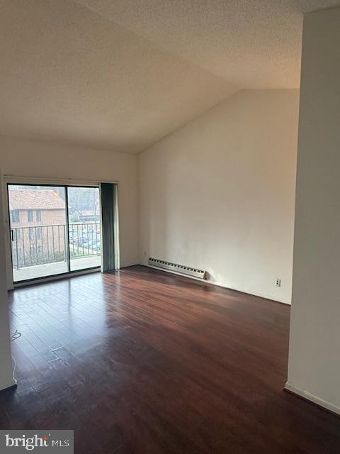 15211 Elkridge Way, Unit 943C Silver Spring, MD 20906 - Photo 4 of 16 a view of an empty room with wooden floor and a window