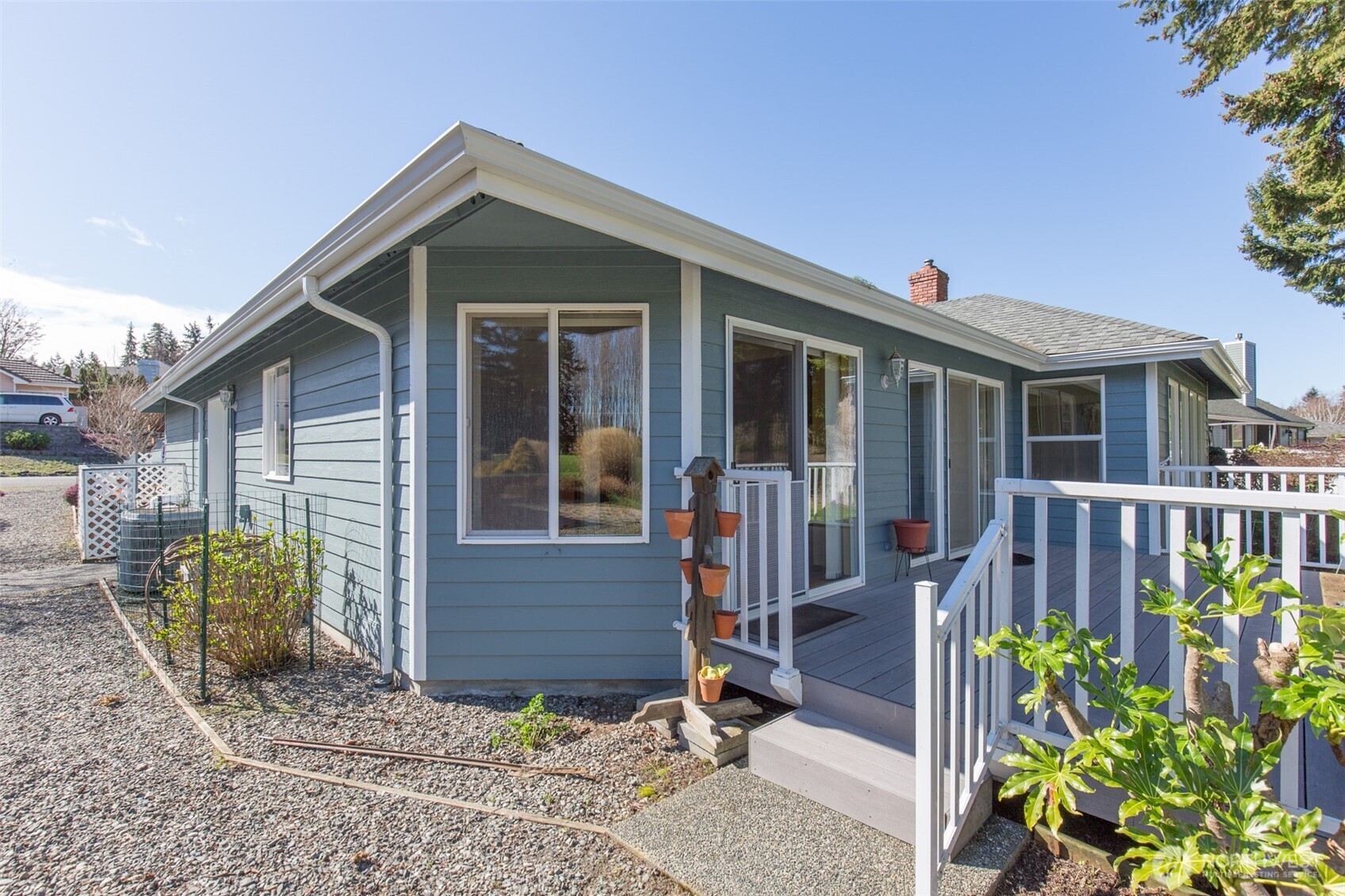 170 Hurricane Ridge Drive Sequim, WA 98382 - Photo 7 of 39 a front view of a house with garden