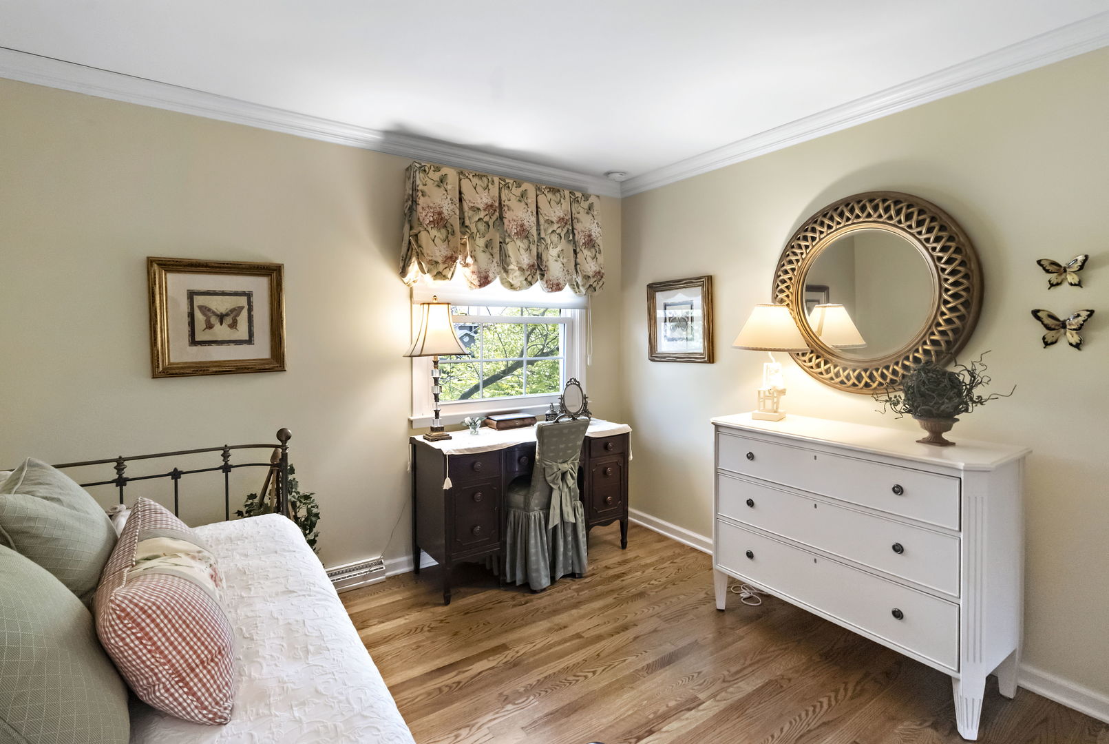1219 Howard Circle Wheaton, IL 60187 - Photo 17 of 26 a bedroom with a bed and a dresser