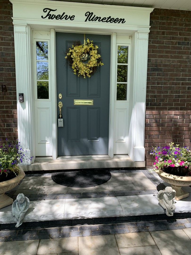 1219 Howard Circle Wheaton, IL 60187 - Photo 2 of 26 a view of a kitchen with stainless steel appliances granite countertop a sink and a stove