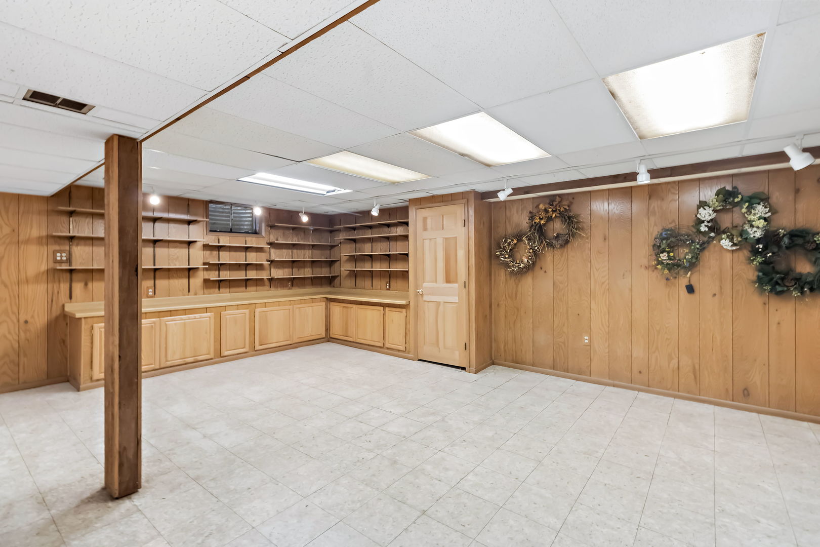 1219 Howard Circle Wheaton, IL 60187 - Photo 23 of 26 a view of a kitchen with a sink and refrigerator
