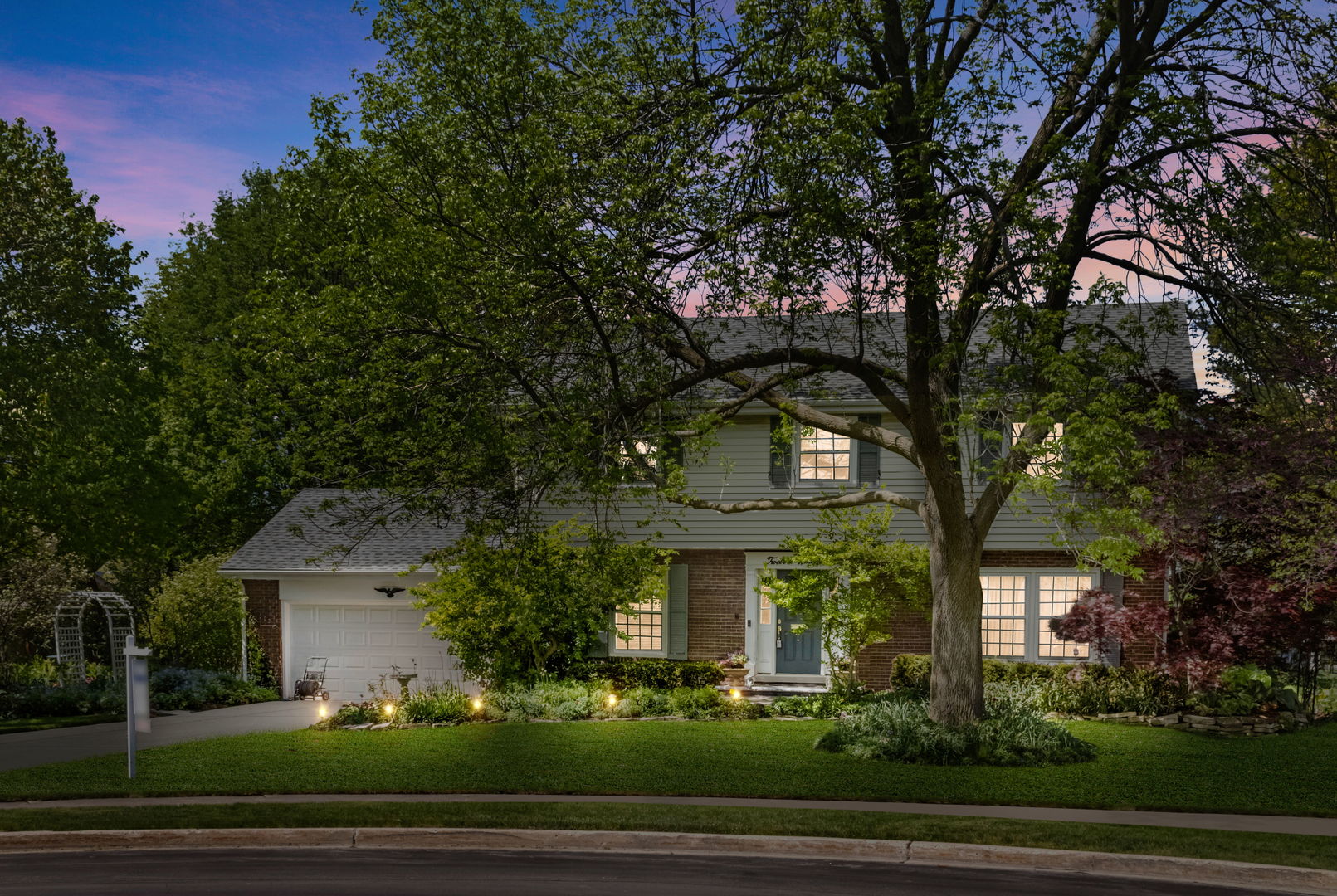 1219 Howard Circle Wheaton, IL 60187 - Photo 3 of 26 a front view of a house with a tree
