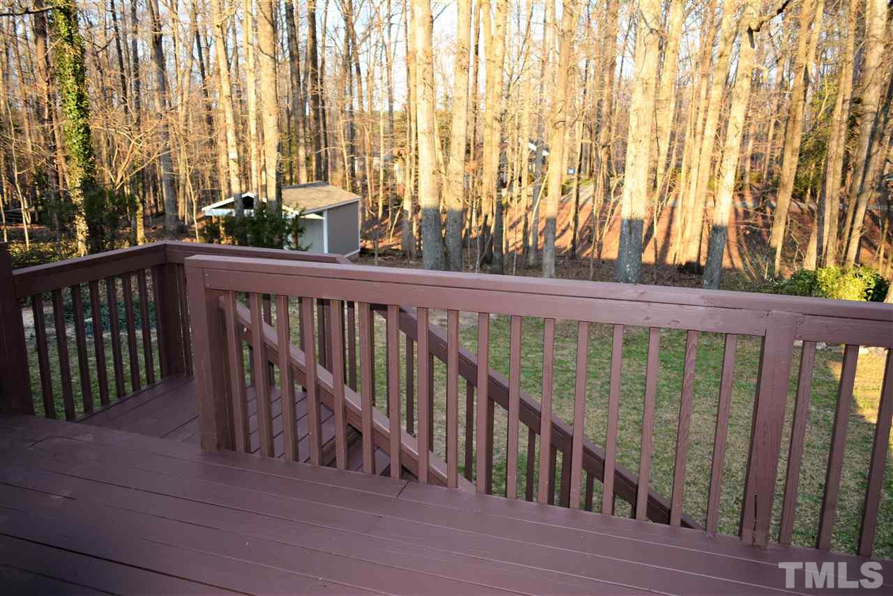 7249 Rock Service Station Road Raleigh, NC 27603 - Photo 23 of 25 View from your deck! Wow, enjoy privacy, also cookout with family & friends! Priceless view of hardwoods and rear lawn.