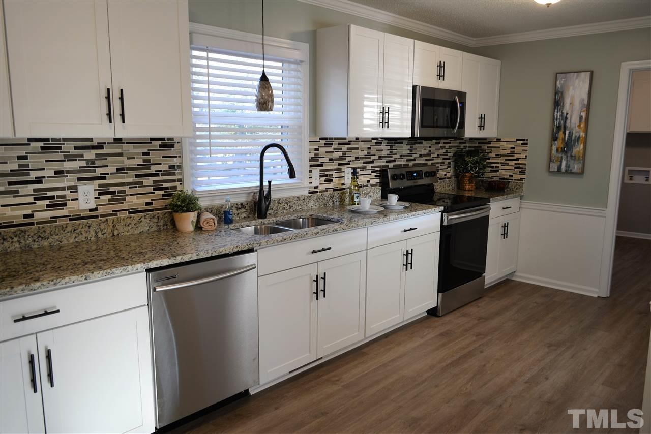 7249 Rock Service Station Road Raleigh, NC 27603 - Photo 6 of 25 Open & spacious-perfect for the cook & entertaining!