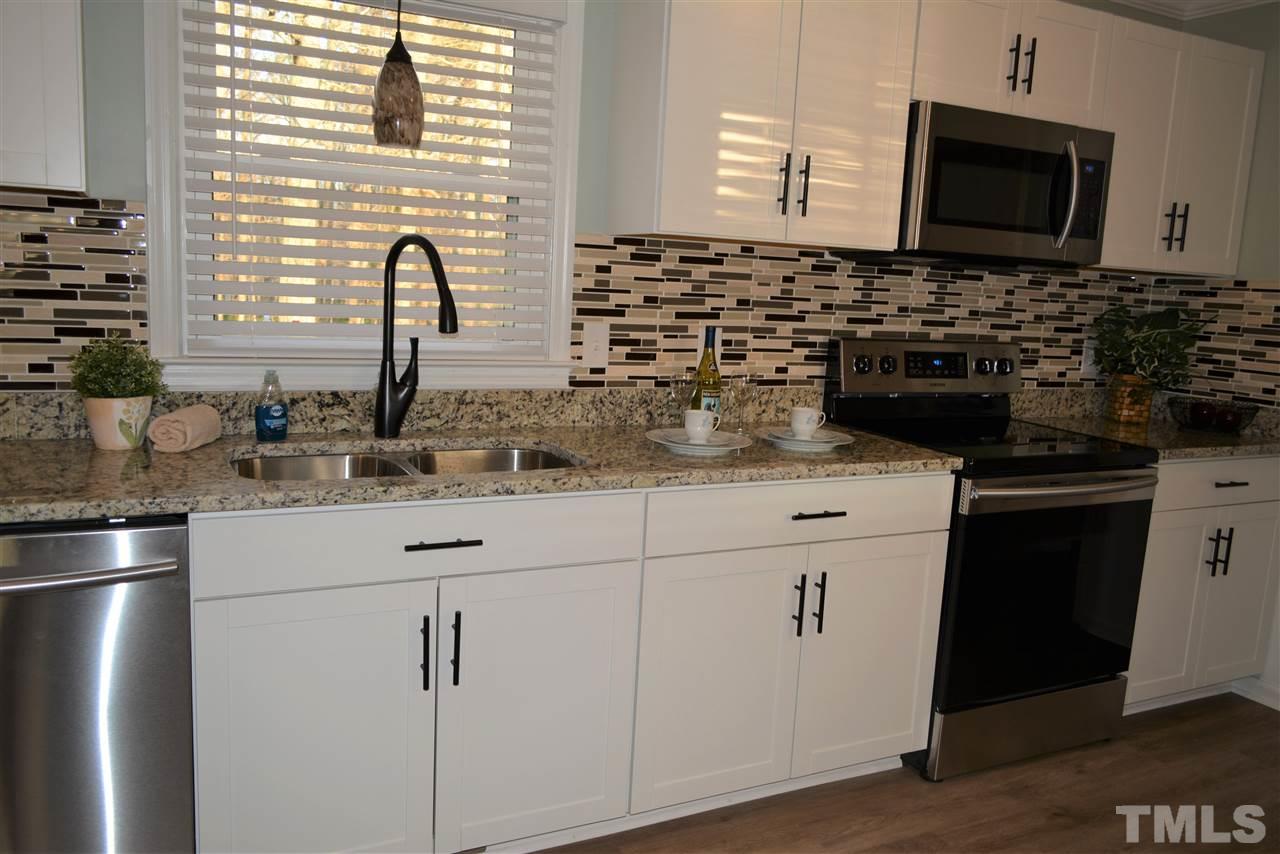 7249 Rock Service Station Road Raleigh, NC 27603 - Photo 8 of 25 Also new sink, new fauct, new blinds, new stainless appliances