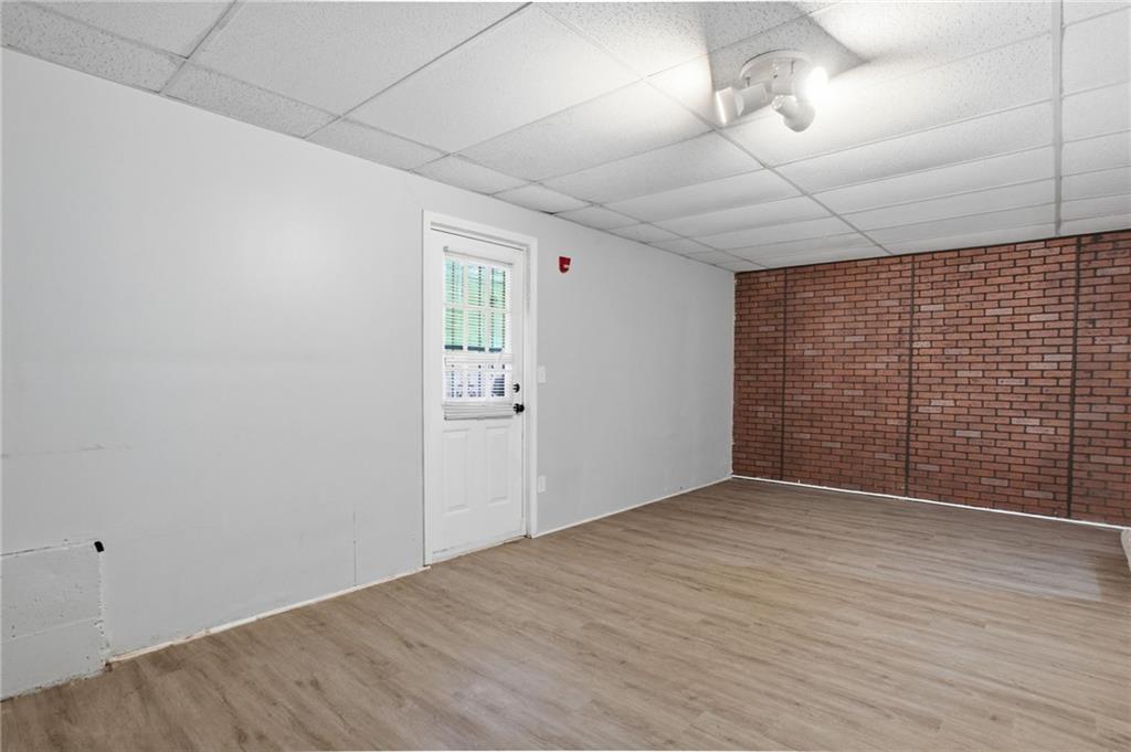 5855 Crescent Ridge Court Lithonia, GA 30058 - Photo 27 of 46 a view of an empty room with wooden floor