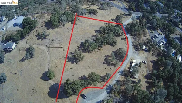 an aerial view of a house swimming pool