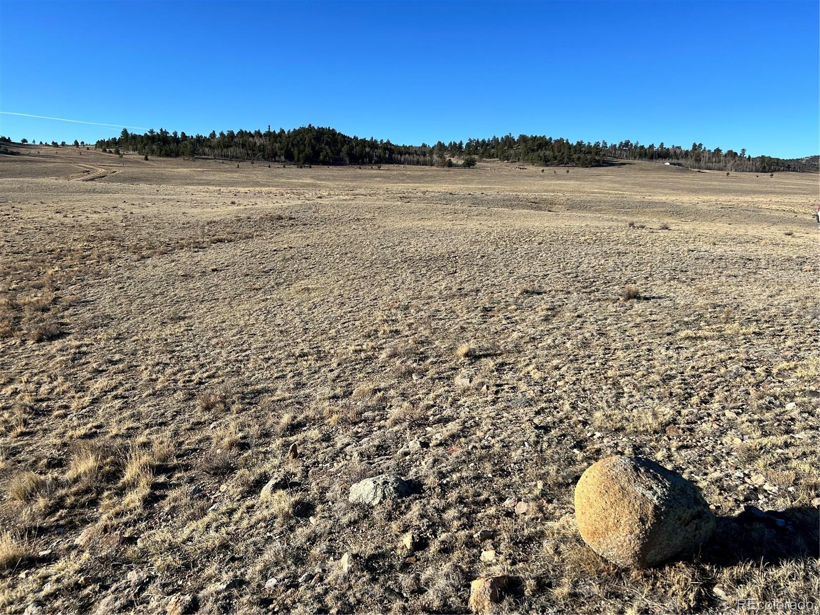 4284 Goldenberg Canyon Road Hartsel, CO 80449 - Photo 16 of 29 a view of lake and mountain