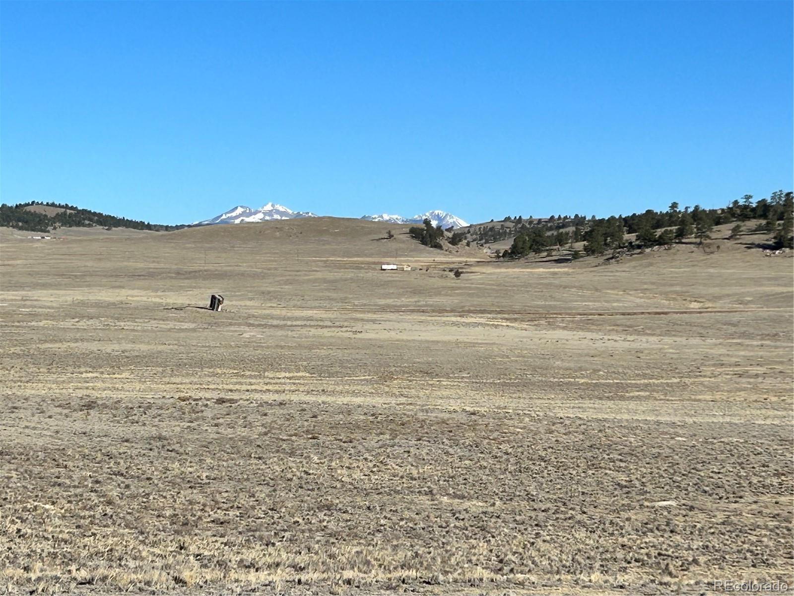 4284 Goldenberg Canyon Road Hartsel, CO 80449 - Photo 2 of 29 a view of ocean with sunset