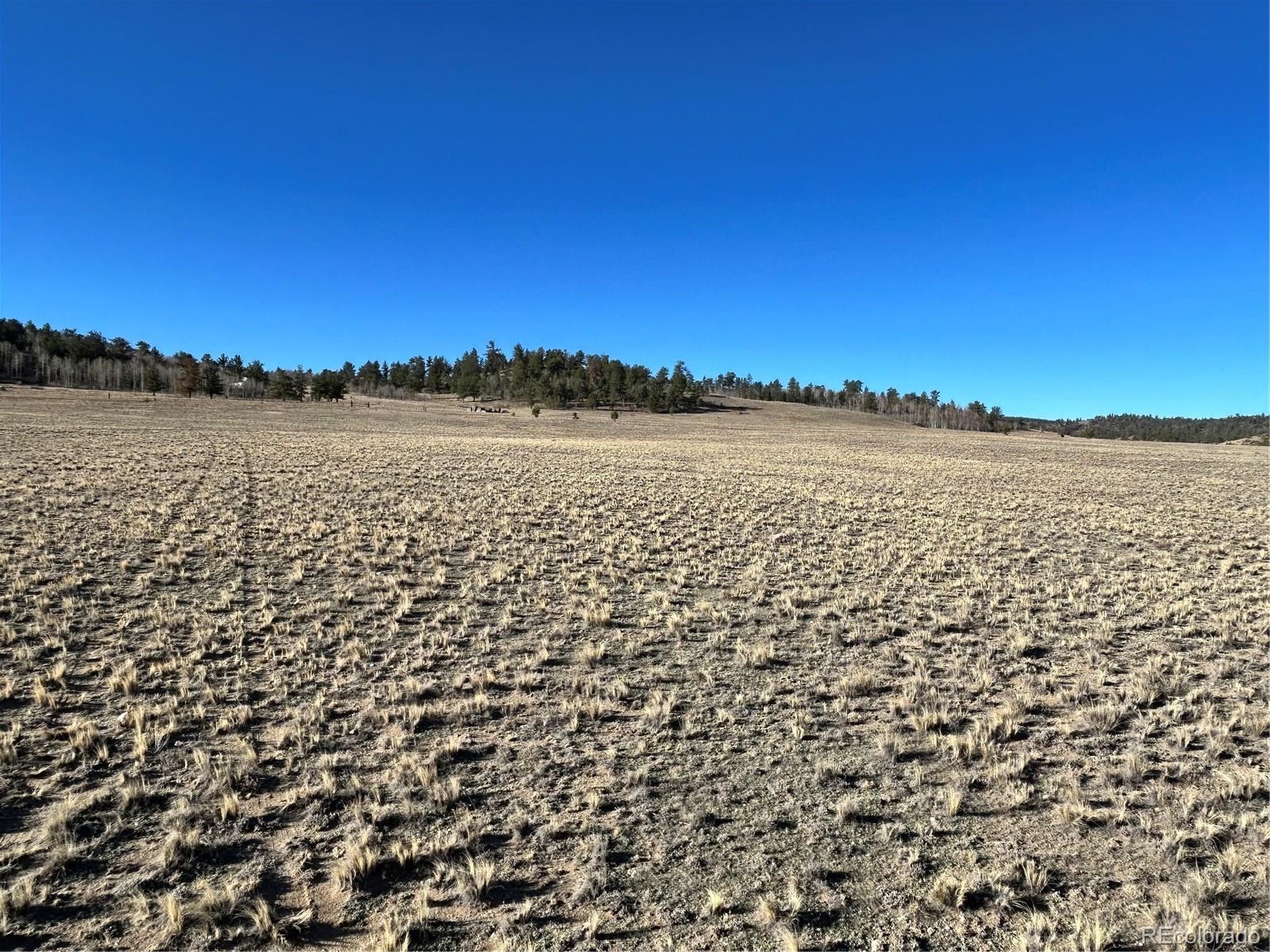 4284 Goldenberg Canyon Road Hartsel, CO 80449 - Photo 25 of 29 a view of lake and sunset