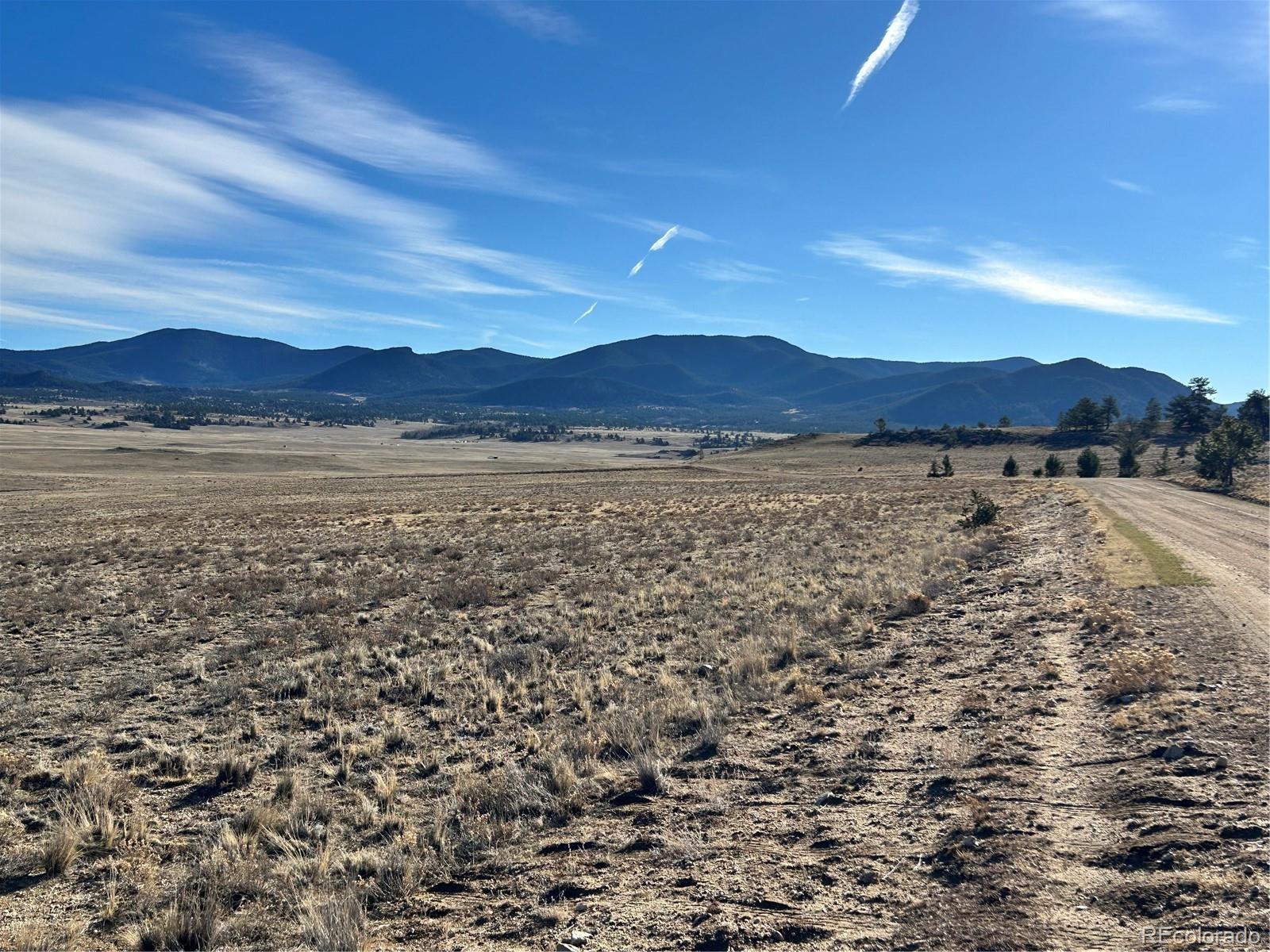 4284 Goldenberg Canyon Road Hartsel, CO 80449 - Photo 6 of 29 a view of an lake and a mountain
