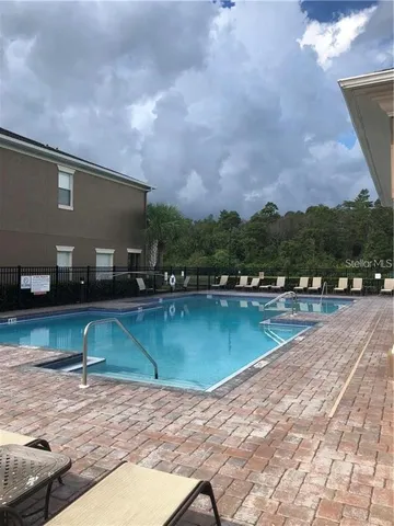 a workspace with furniture and a window