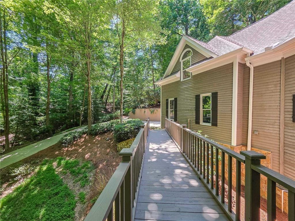 3712 Frederica Road Northwest Berkeley Lake, GA 30096 - Photo 4 of 49 a view of a house with backyard