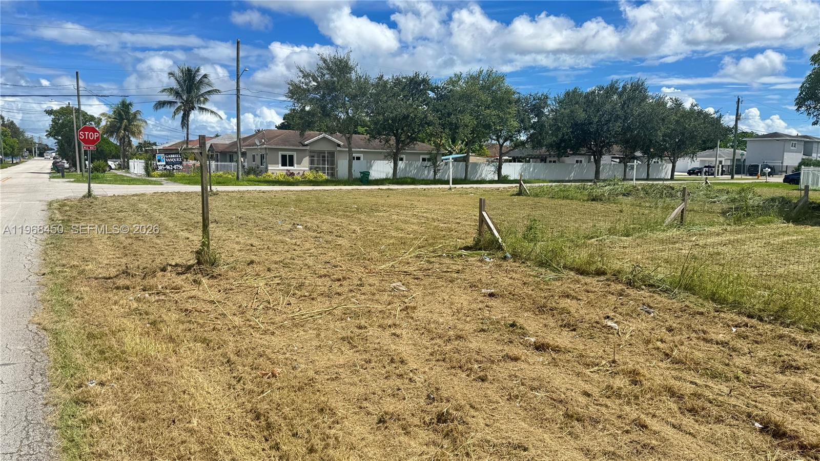 12208 Southwest 220th Street Miami, FL 33170 - Photo 3 of 4 a view of a playground with basketball court