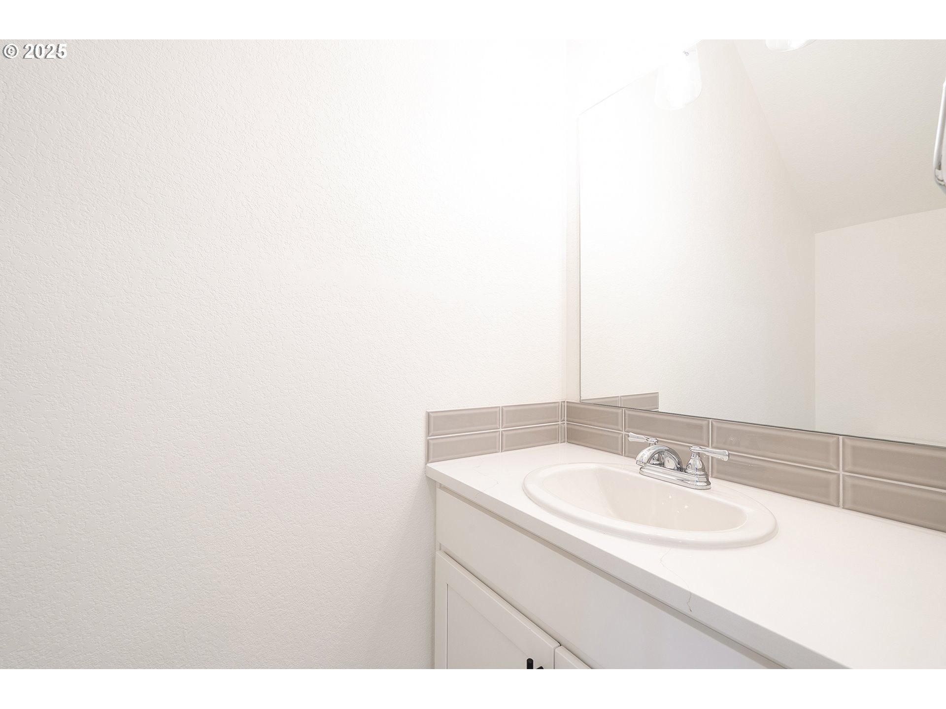 14720 Southeast Powell Boulevard Portland, OR 97236 - Photo 8 of 16 a bathroom with a sink and a mirror