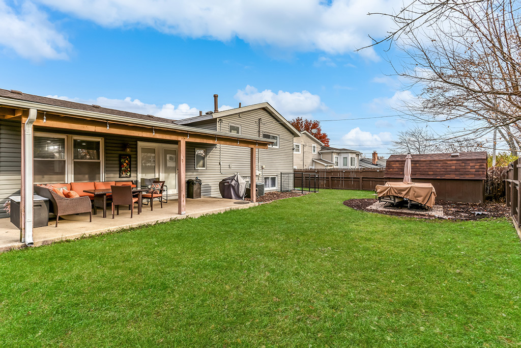 5113 Coulter Road Oak Forest, IL 60452 - Photo 2 of 13 a view of a house with backyard porch and sitting area